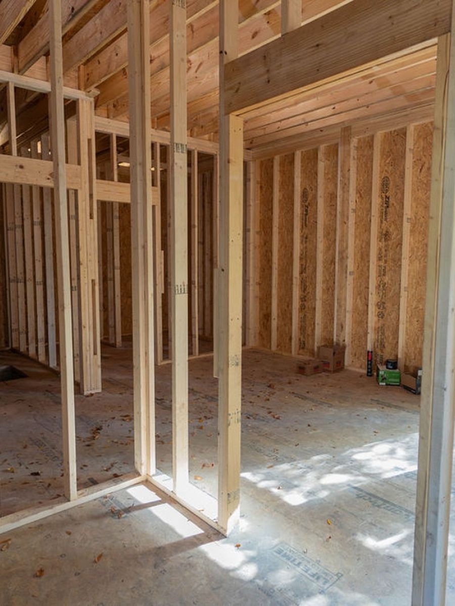 House Under Construction With Wooden Framing And Drywall