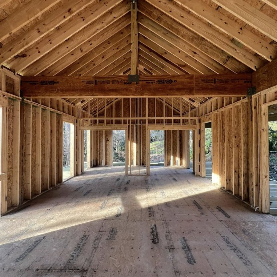 New House Interior Framing With Wooden Structure And Light