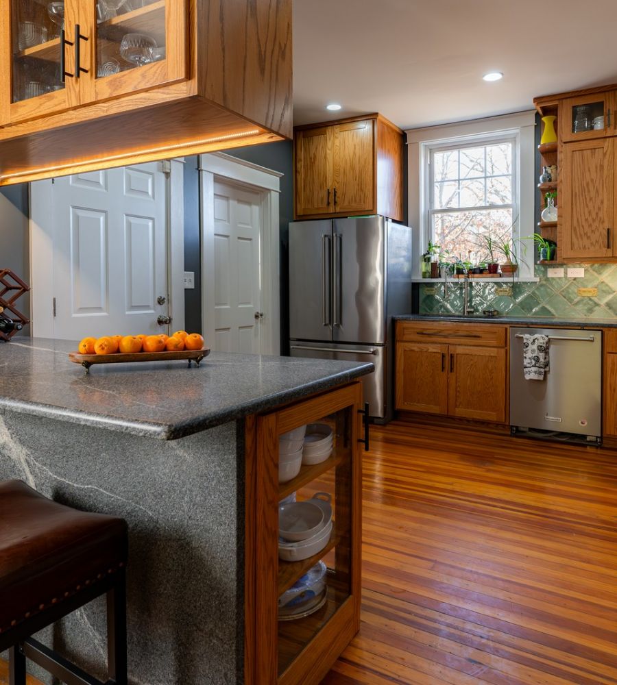 Modern Open Kitchen With Wooden Cabinets And Granite Countertops