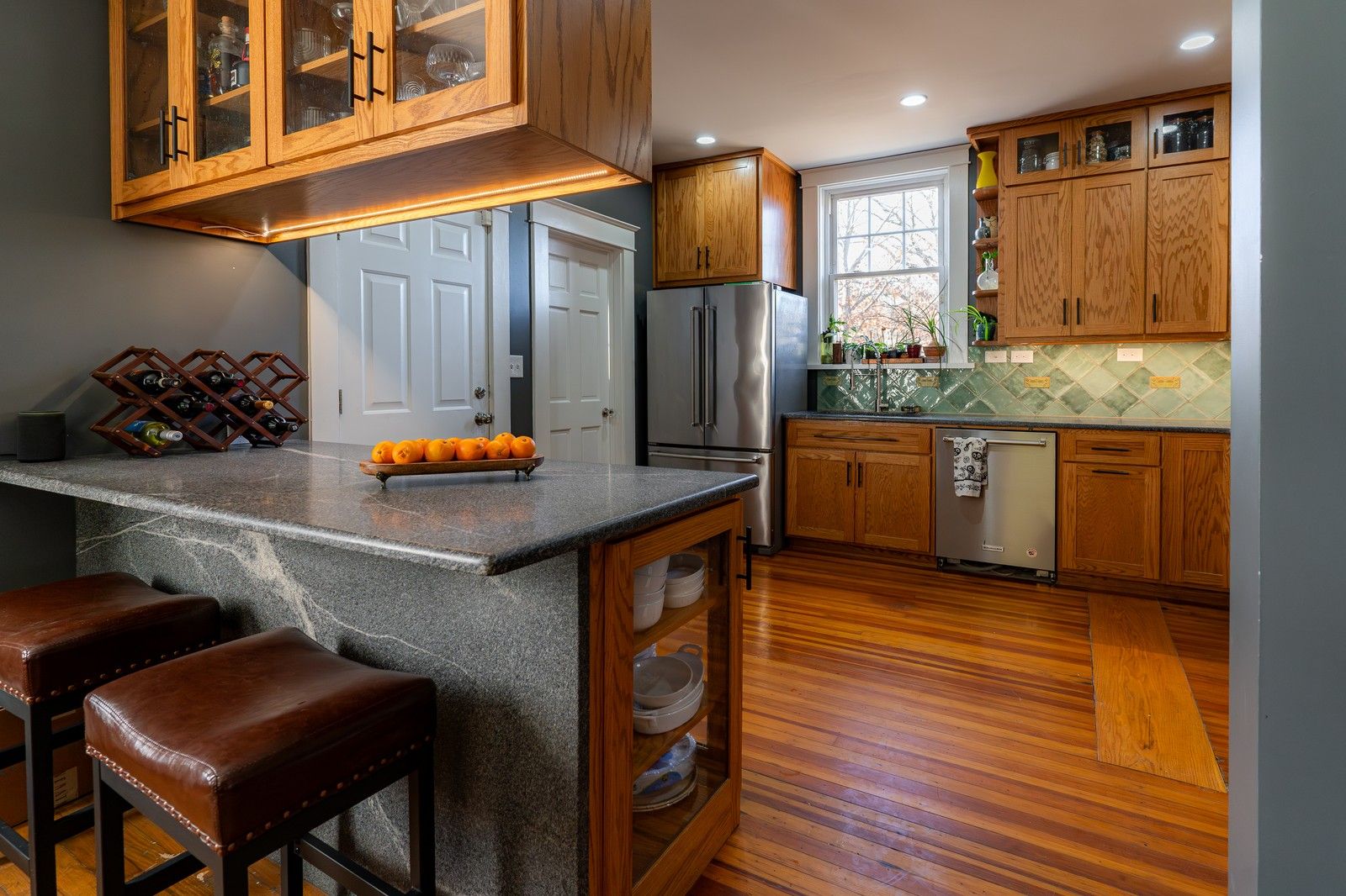 Modern Open Kitchen With Wooden Cabinets And Granite Countertops
