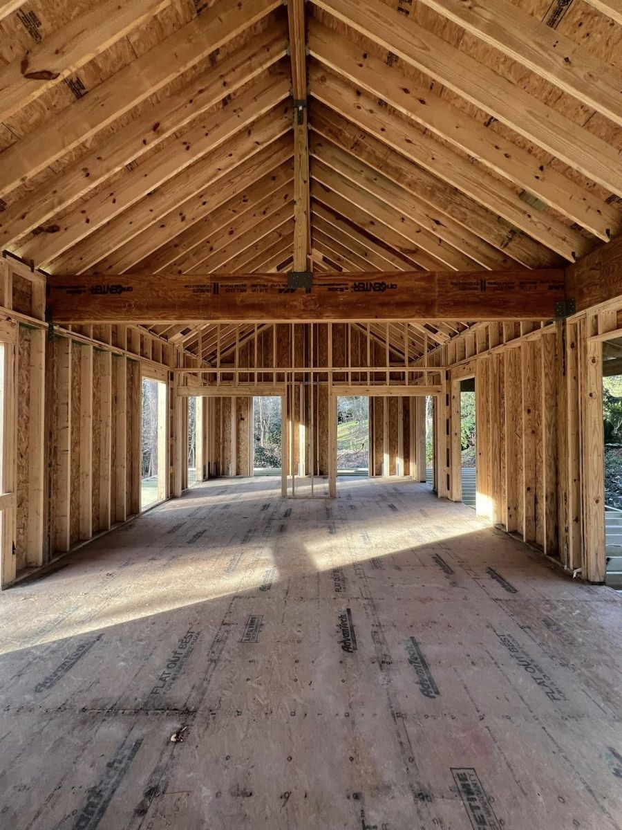 New House Interior Framing With Wooden Structure And Light